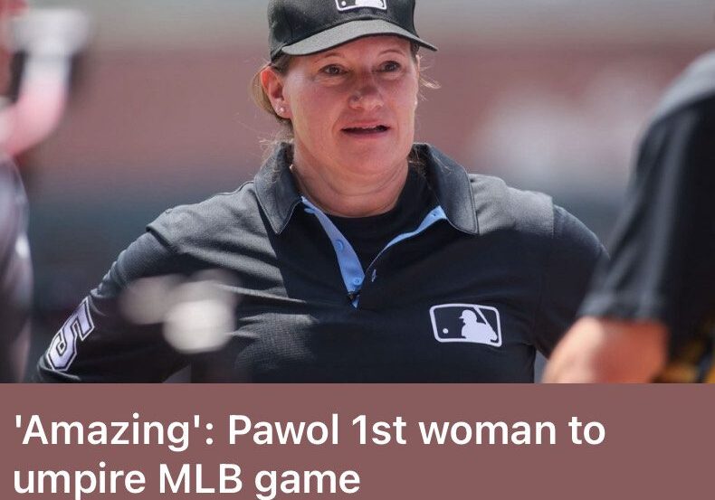 Pawol, first woman umpire in an MLB game, stands focused on the field.